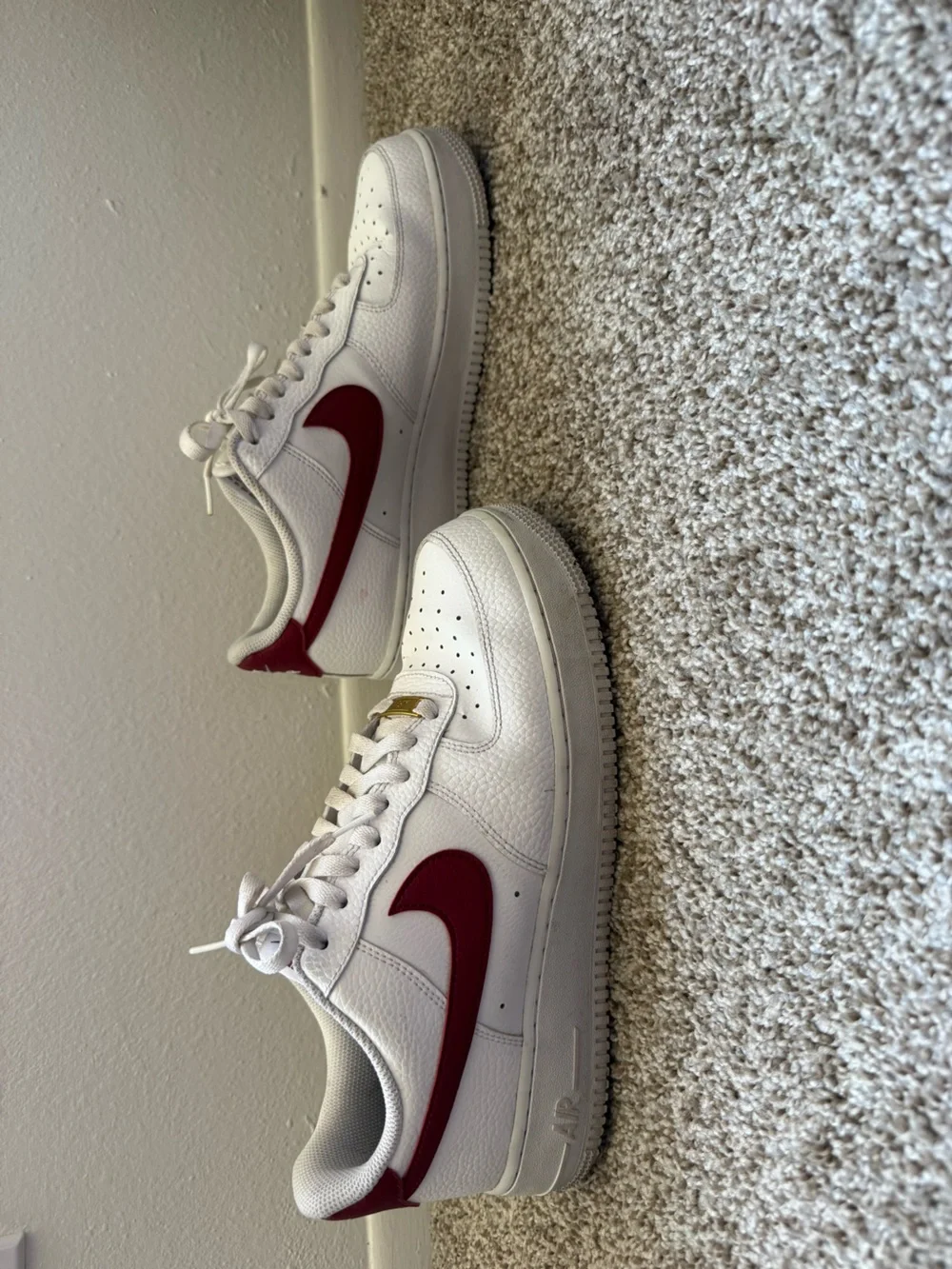 Nike Men’s White Leather Sneakers with Red Swoosh